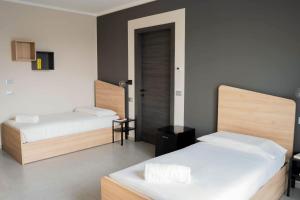 A bed or beds in a room at Terranova49