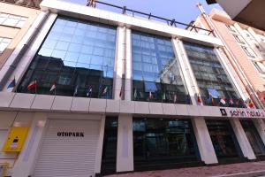 a building with flags in front of it at R S CİTY HoTEL in Samsun