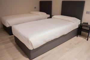 A bed or beds in a room at Terranova49