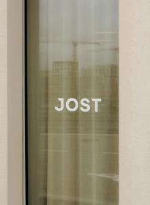 a glass window with the word lost written on it at JOST Hotel Montpellier Centre St Roch in Montpellier