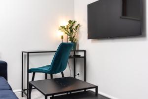 Telewizja i/lub zestaw kina domowego w obiekcie Ariańska apartment - Cracow, city centre
