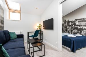 Telewizja i/lub zestaw kina domowego w obiekcie Ariańska apartment - Cracow, city centre