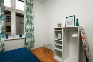 Łóżko lub łóżka w pokoju w obiekcie Apartament blisko Wawelu