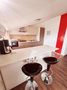 Kuchyň nebo kuchyňský kout v ubytování Apartments Nada