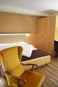 Postel nebo postele na pokoji v ubytování Hotel Karin