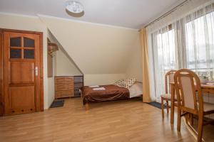 Posteľ alebo postele v izbe v ubytovaní Willa Bukowina