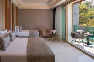 Postel nebo postele na pokoji v ubytování Vogue Hotel Supreme Bodrum