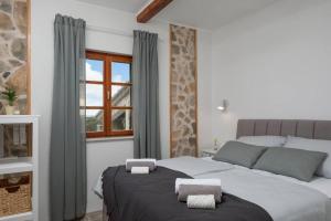 Posteľ alebo postele v izbe v ubytovaní Villa Adamaris