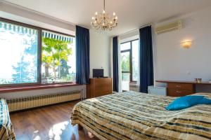 Posteľ alebo postele v izbe v ubytovaní Villa Carmen Rooms & Apartments