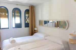 Postel nebo postele na pokoji v ubytování Corner Place 21 - Centro Histórico