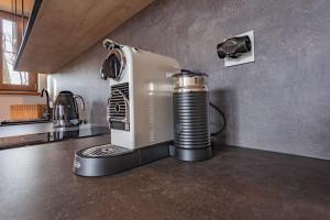 Kuchyňa alebo kuchynka v ubytovaní Green Park Resort D28- z dostępem do basenu, sauny, jacuzzi, siłowni