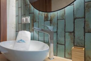 Kúpeľňa v ubytovaní Green Park Resort D28- z dostępem do basenu, sauny, jacuzzi, siłowni