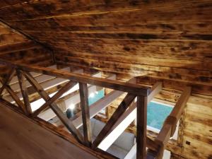 an overhead view of the wooden ceiling of a building at Domki letniskowe Hamer in Łeba