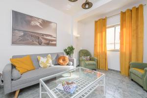 Posedenie v ubytovaní WintowinRentals Ubicación fabulosa, completo apartamento con Parking en el Soho de Málaga