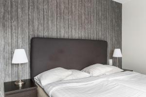 Postel nebo postele na pokoji v ubytování Best Western Hotel Tranas Statt