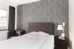 Postel nebo postele na pokoji v ubytování Best Western Hotel Tranas Statt