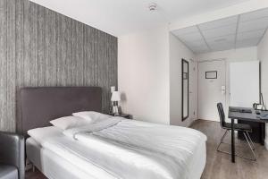 Postel nebo postele na pokoji v ubytování Best Western Hotel Tranas Statt