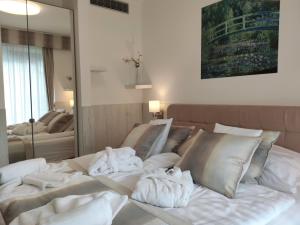 Posteľ alebo postele v izbe v ubytovaní Spa Residence Carbona Iguacu Apartman