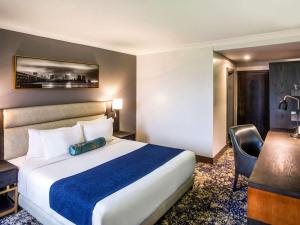 Voodi või voodid majutusasutuse Mövenpick Hotel Ikoyi Lagos toas