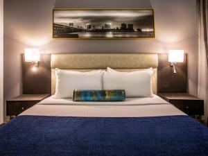 Voodi või voodid majutusasutuse Mövenpick Hotel Ikoyi Lagos toas