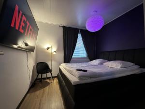 Postel nebo postele na pokoji v ubytování Spectacular River View - Downtown Rovaniemi