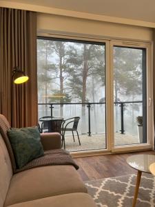 Część wypoczynkowa w obiekcie Sosnowe Apartamenty - Marina