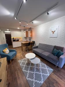 Część wypoczynkowa w obiekcie Sosnowe Apartamenty - Marina