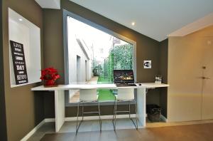 TV a/nebo společenská místnost v ubytování Hotel BESTPRICE Diagonal