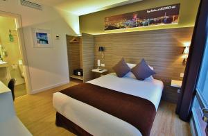 Postel nebo postele na pokoji v ubytování Hotel BESTPRICE Diagonal