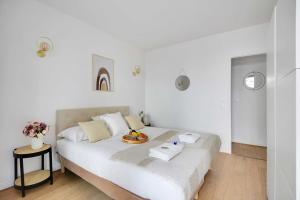 Posteľ alebo postele v izbe v ubytovaní Elegant apartment - 2BR-6P - Tour Eiffel