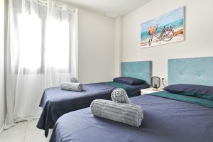 Posteľ alebo postele v izbe v ubytovaní Apartment Onde