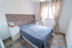 Posteľ alebo postele v izbe v ubytovaní Apartamento Torresol #