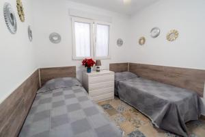 Posteľ alebo postele v izbe v ubytovaní Apartamento Torresol #