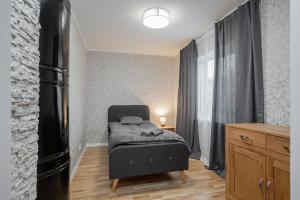 Postel nebo postele na pokoji v ubytování Loode lux with sauna