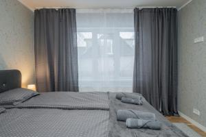 Postel nebo postele na pokoji v ubytování Loode lux with sauna