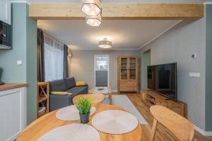 TV a/nebo společenská místnost v ubytování Loode lux with sauna