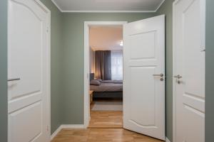 Postel nebo postele na pokoji v ubytování Loode lux with sauna