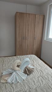 Katil atau katil-katil dalam bilik di Apartmani Moskva