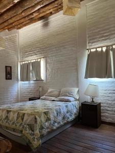 Cama ou camas em um quarto em BanTelmo