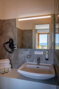 Koupelna v ubytování Hôtel l'Albatros