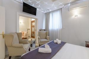 Posteľ alebo postele v izbe v ubytovaní Presidential Apartment by Athens Stay