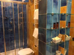 Koupelna v ubytování Locanda dei Poeti Rooms & Apartments