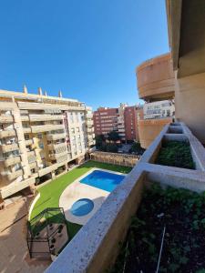 Bazén v ubytovaní Apto 2 hab Playa y Aeropuerto - Martín Carpena alebo v jeho blízkosti