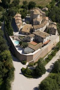 an aerial view of a house with a swimming pool at Casa Oliva borgo del Benessere Olistico in Bargni