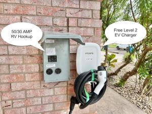 a pay meter attached to a brick wall at Sleeps 22, 7 bedrooms, 2min walk To The Beach, Private Heated Pool and Hot Tub, Zula Del Mar South Padre Island Texas in South Padre Island +40 photos