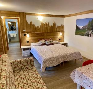 Posteľ alebo postele v izbe v ubytovaní Résidence Château Royal