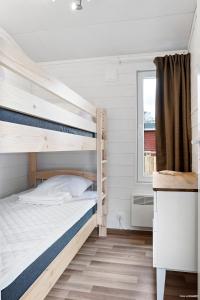 Postel nebo postele na pokoji v ubytování First Camp Karlstorp-Halmstad