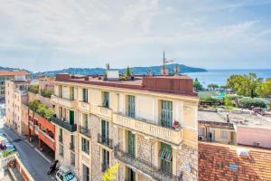 an aerial view of a building in a city at #24 Marie-Claire Suite Sea view/balcony/AC/5min port in Villefranche-sur-Mer