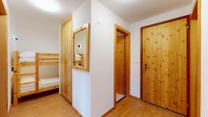 Postel nebo postele na pokoji v ubytování Pracondu 1 403 - OUTDOOR & FUN charming apartment