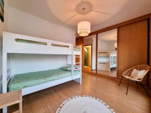Ένα ή περισσότερα κρεβάτια σε δωμάτιο στο Penthouse at Cabedelo Beach with Ocean View
